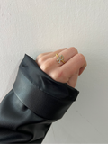 Zircon Letter Torchon Ring